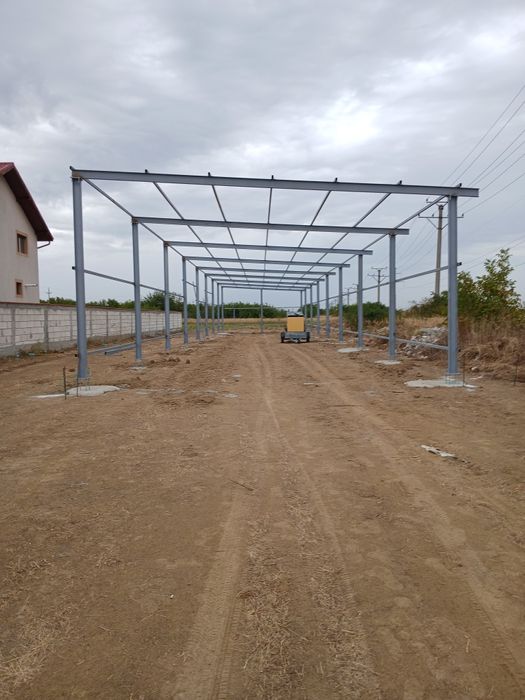 vând structură metalică 10 m lățime 25 lungimea 4 m la ștrasină din pr