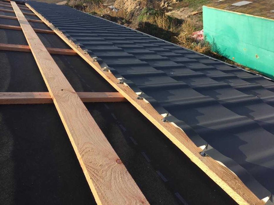 Executam orice tip acoperis, mansardare, sisteme pluviale