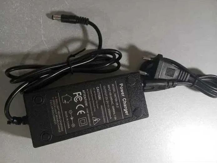 зарядка на 25,2v 2A блок питания на самокат. или от пылесоса.