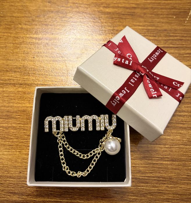 Brosa inscriptionata