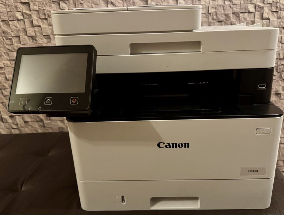 Принтери Brother и Canon
