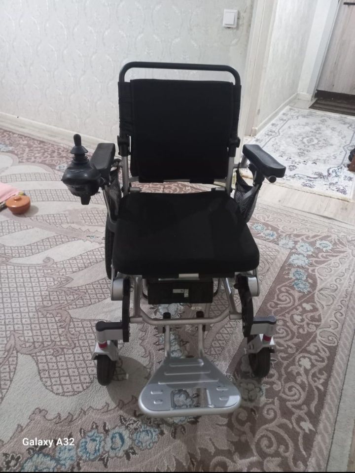 Инвалидный электронный коляска