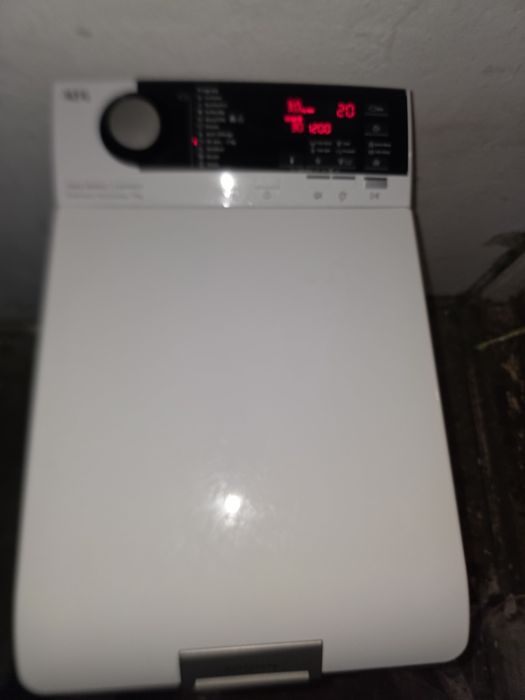 Masina de spălat verticală AEG 7kg 1200 rotații