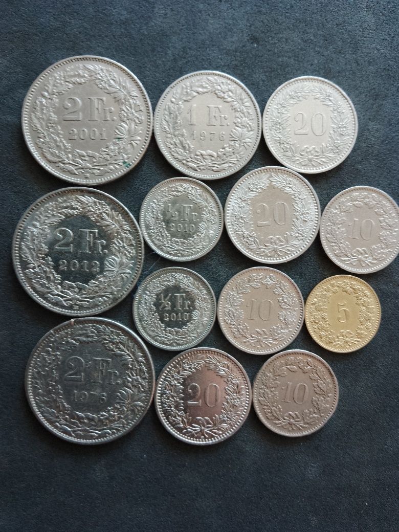 Vind și schimb mai multe monede românești și străine pentru colecție