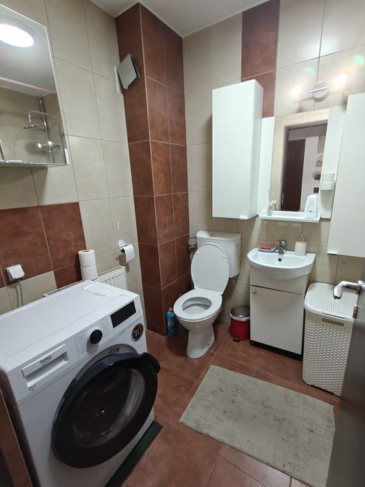Dau in chirie apartament living open-space plus dormitor