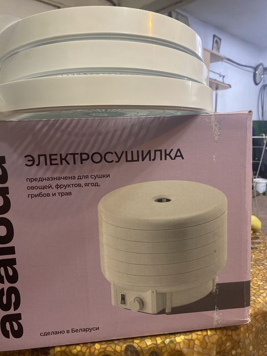 Элктросушилка в упаковке с запасными кругами