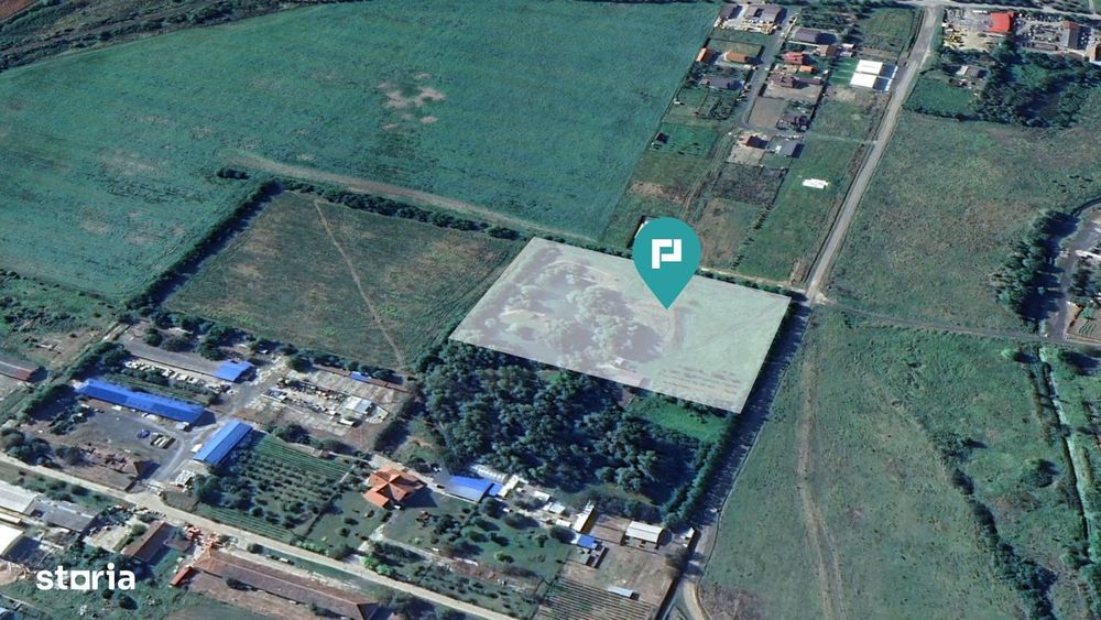 Teren intravilan cu baltă de pescuit