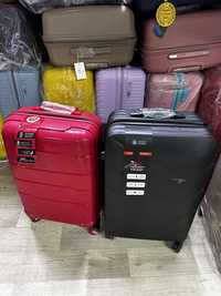 Пластиковые, гелевые, тканевые чемоданы