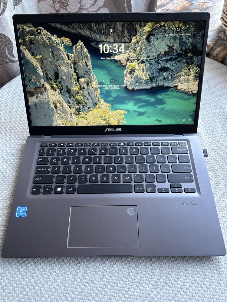 Laptop ASUS ultra portabil 14 inch full HD,amprenta,tasta. iluminata