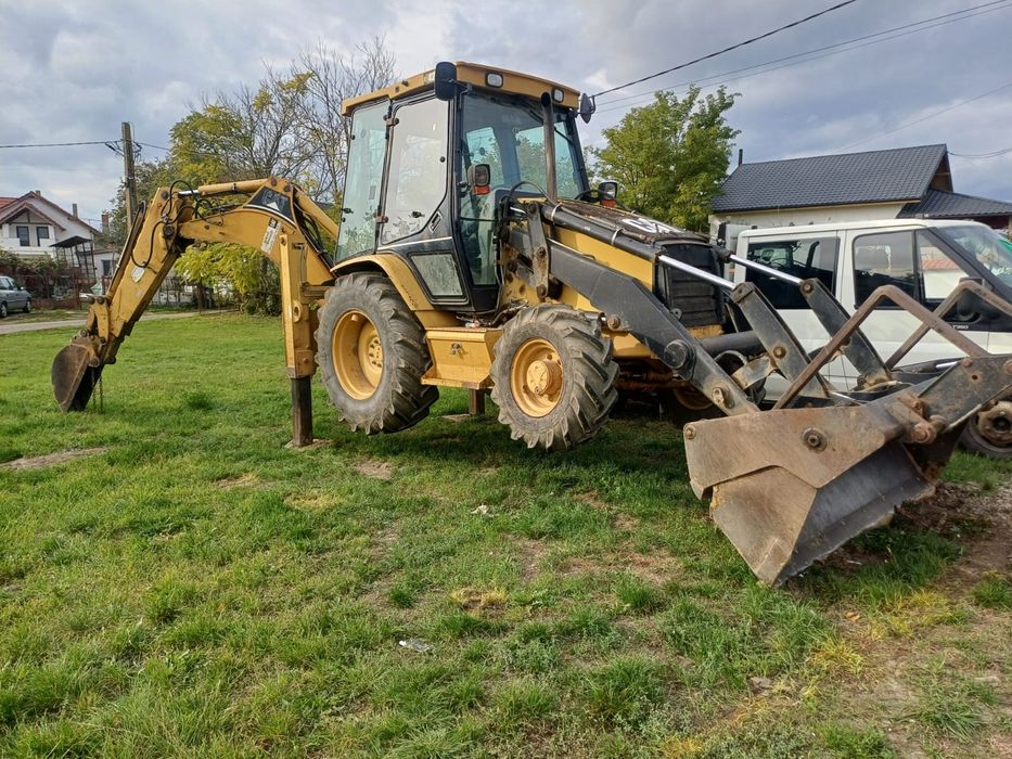 Buldoexcavator Cat 428d