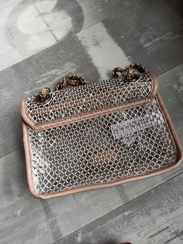 Дамски чанти на  DKNY Guess, Aldo , USPA