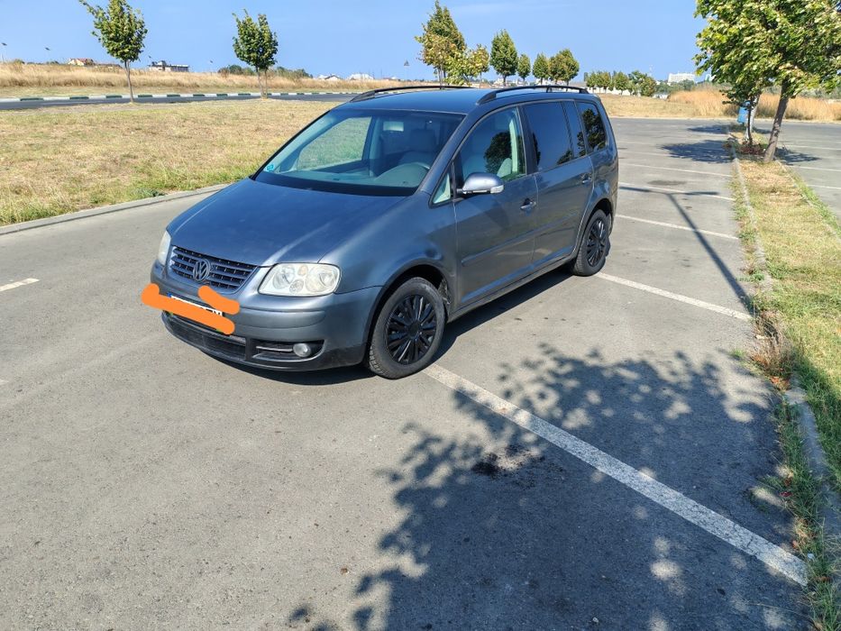 Volkswagen Touran 1.6 benzina și gpl 1650 e neg.