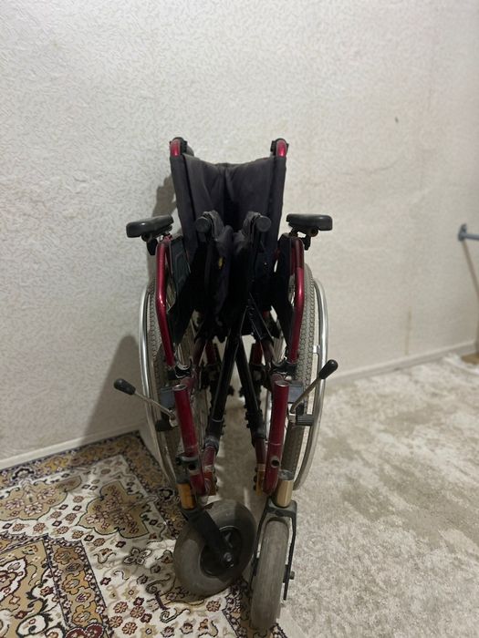 Инвалидная коляска