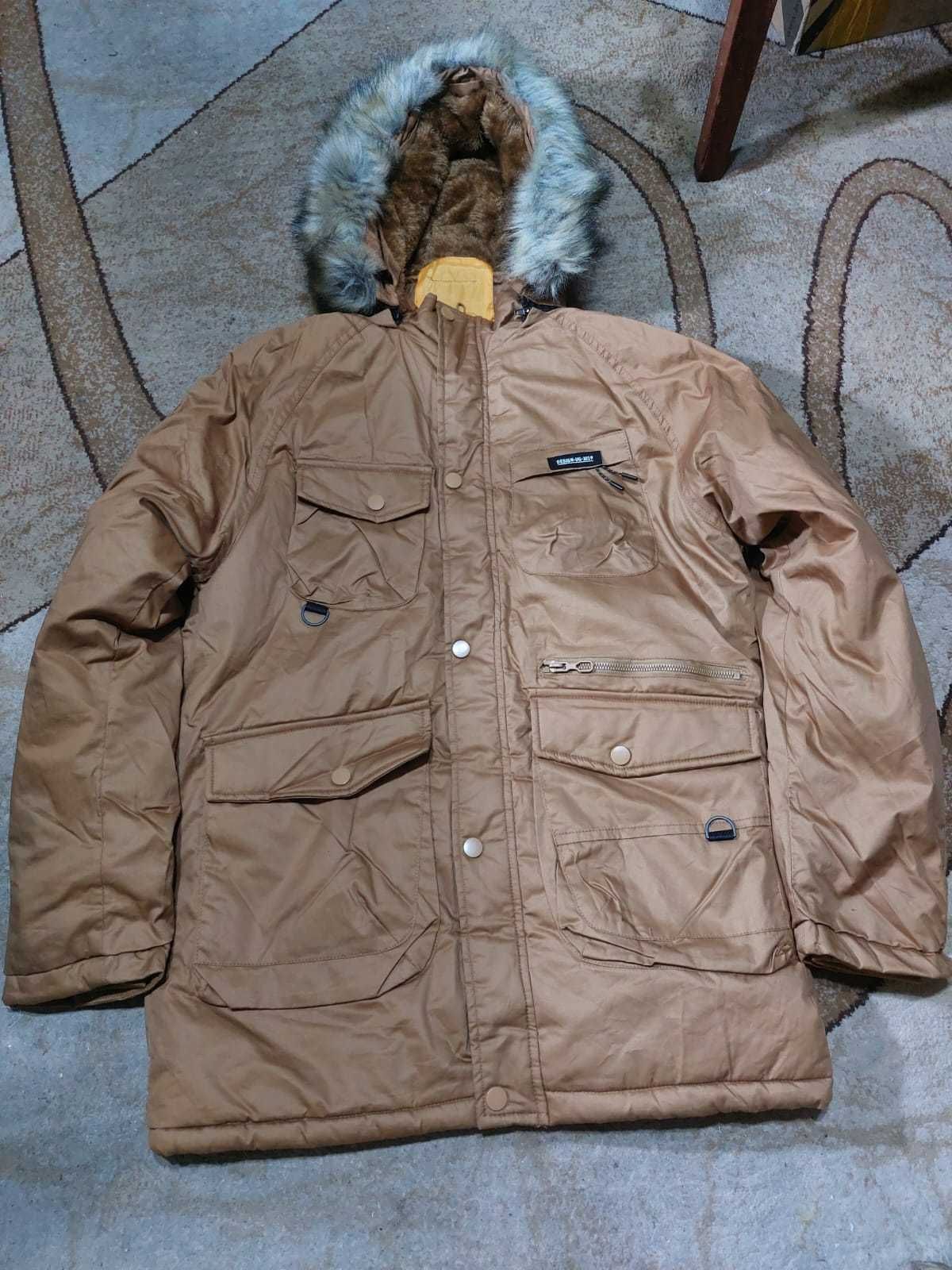 продам новую зимнюю куртку р.48-50.