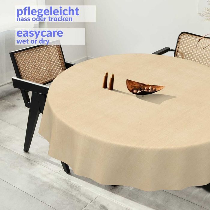 Покривка за маса от мушама, която може да се пере, кръгла или правоъг.