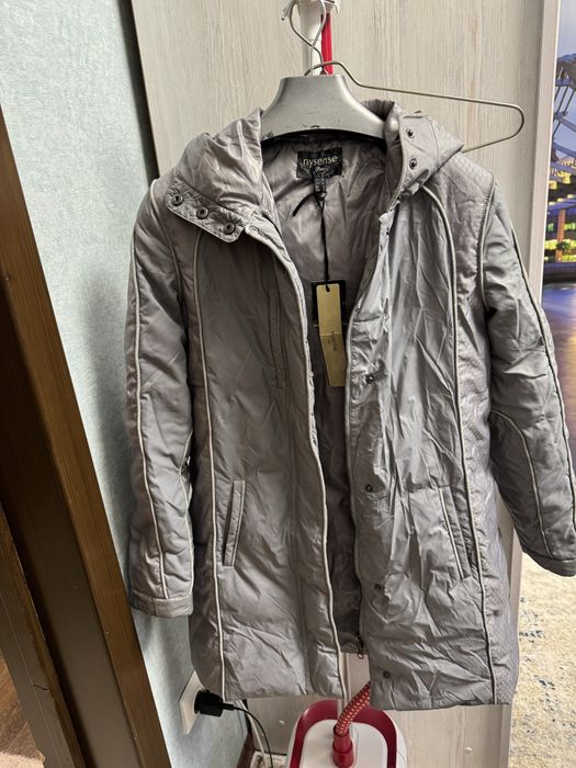 Пуховики новые, привозные.