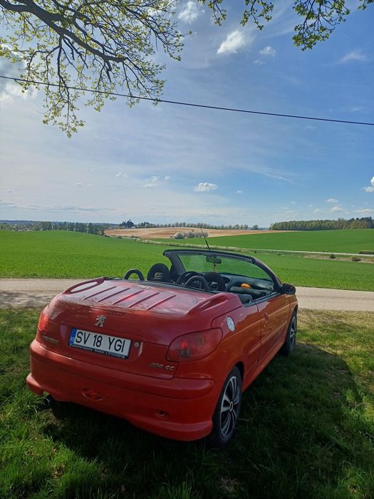 Se vinde Peugeot 206cc (furia roșie)