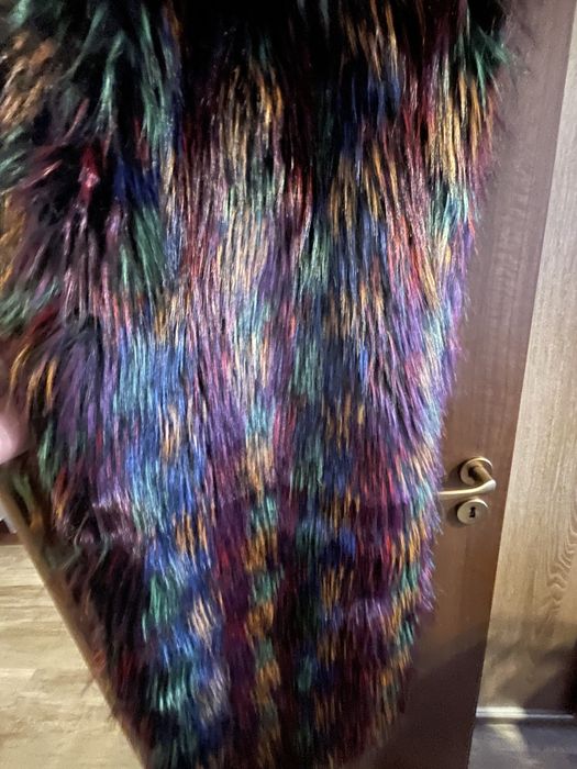 Vesta lunga din blana artificiala.