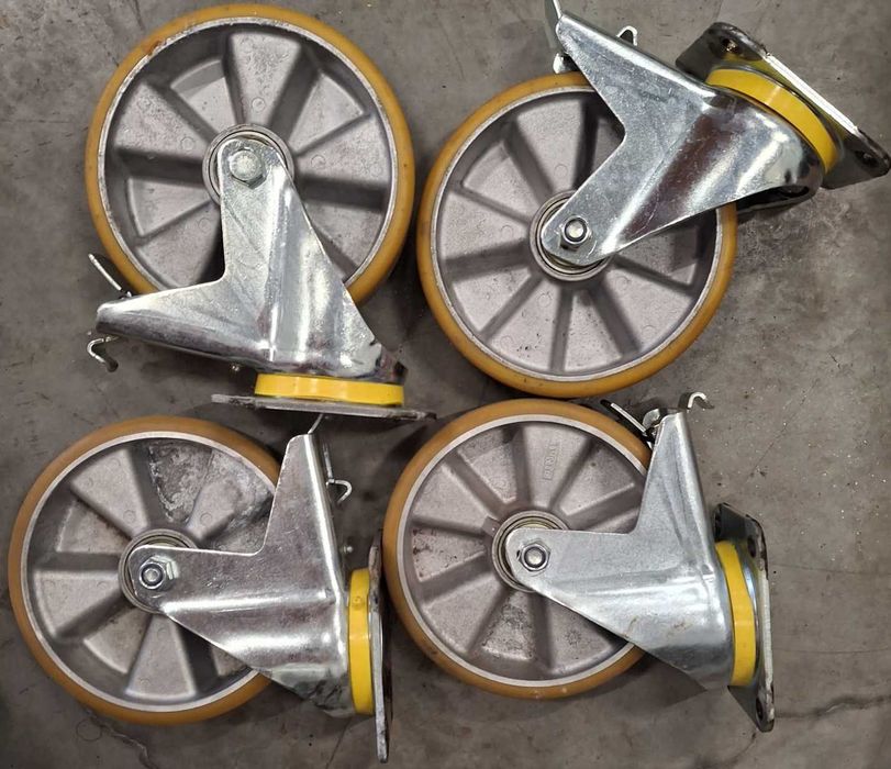 Vand 4 roti pivotante ptr. sarcini grele,cu frana,diam. 200mm