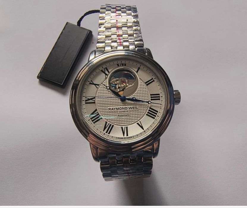 Швейцарские часы фирмы Raymond Weil