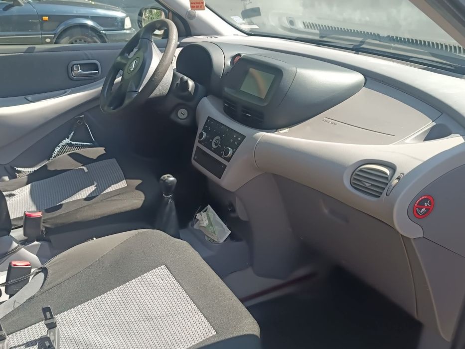 Нисан Алмера Тино