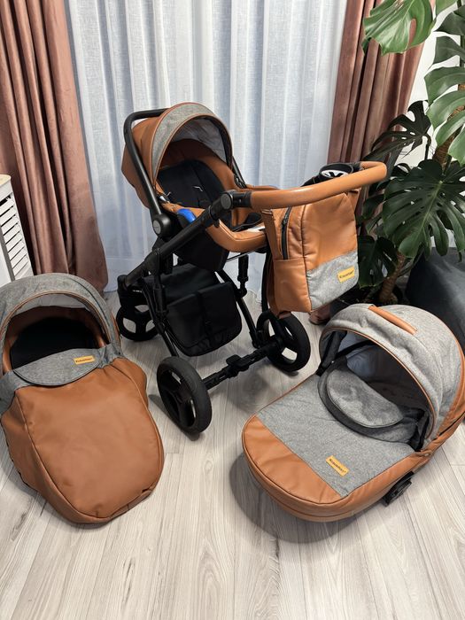 Carucior Krausman 3 in 1 + un carucior cadou si 3 cearsafuri mici