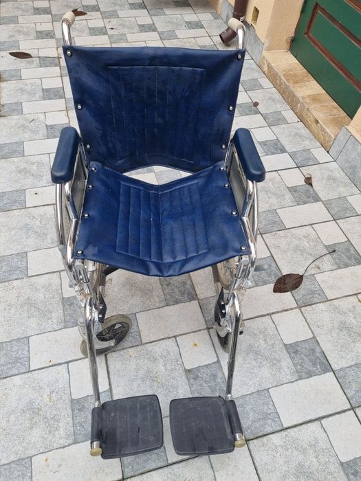 Scaun  cu rotile,carucior