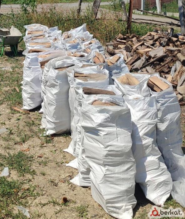 Уголь в мешках дрова в мешках