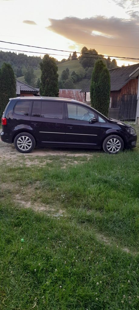 Vând touran în stare buna