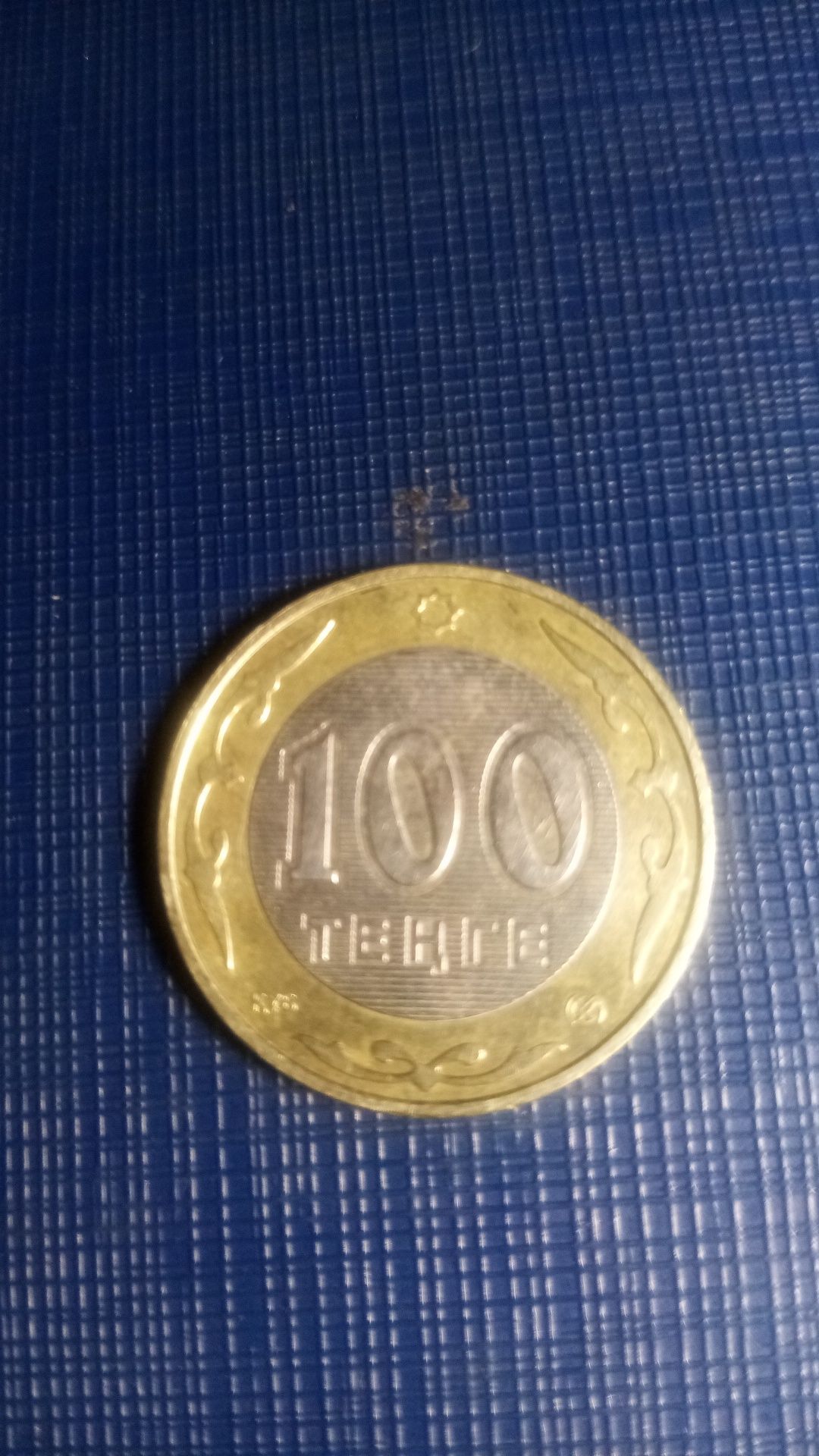Продам редкую монету   100 тг "60 лет ООН"