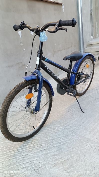 Bicicleta aproape noua