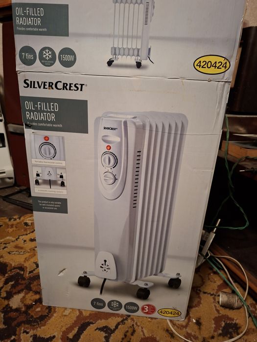 Calorifer Nou Radiator ulei 7 elemenți 1500w si bonus radiator electr