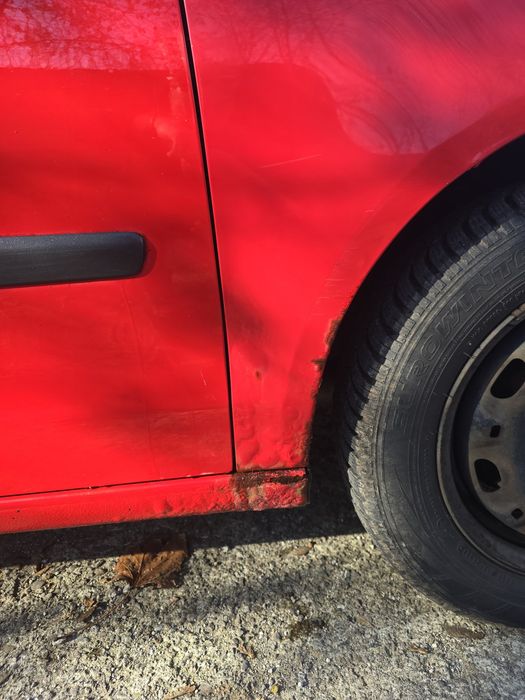 Volkswagen Polo 9N – 2006 – Roșu – 1.2 Benzină (47 CP)