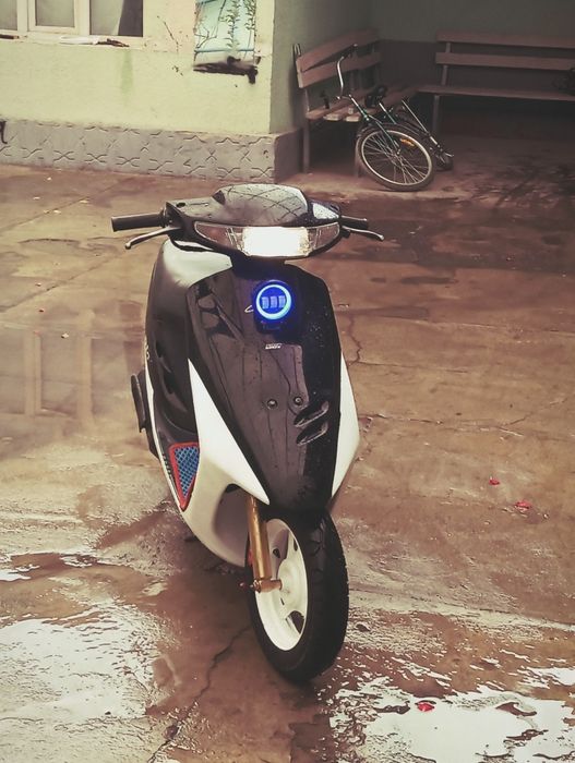 Хонда Дио аф 27 .