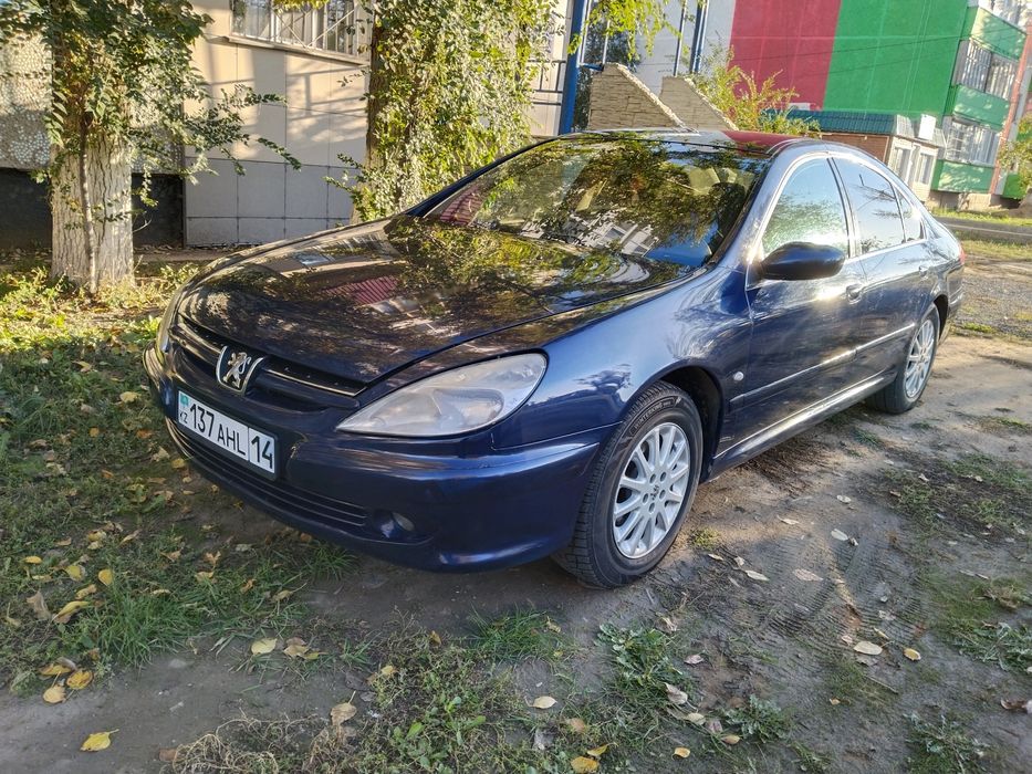 Пежо 607. Обём двигателя 2,2.