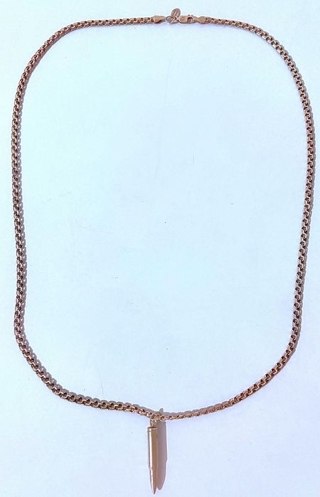 Серебряная цепочка с подвеской в виде патрона