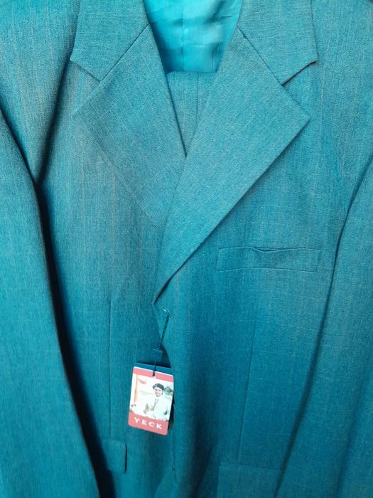 Продам новый мужской костюм