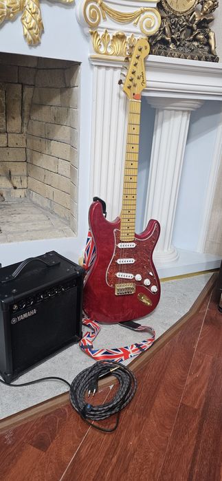 Электрогитара фирмы Fender.