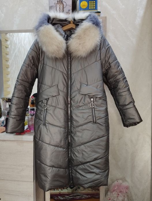 Женский пуховик.