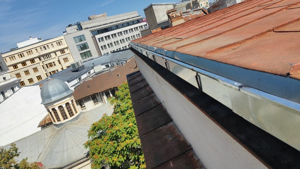 Reparatii jgheaburi burlane țiglă metalică tablă zincată
