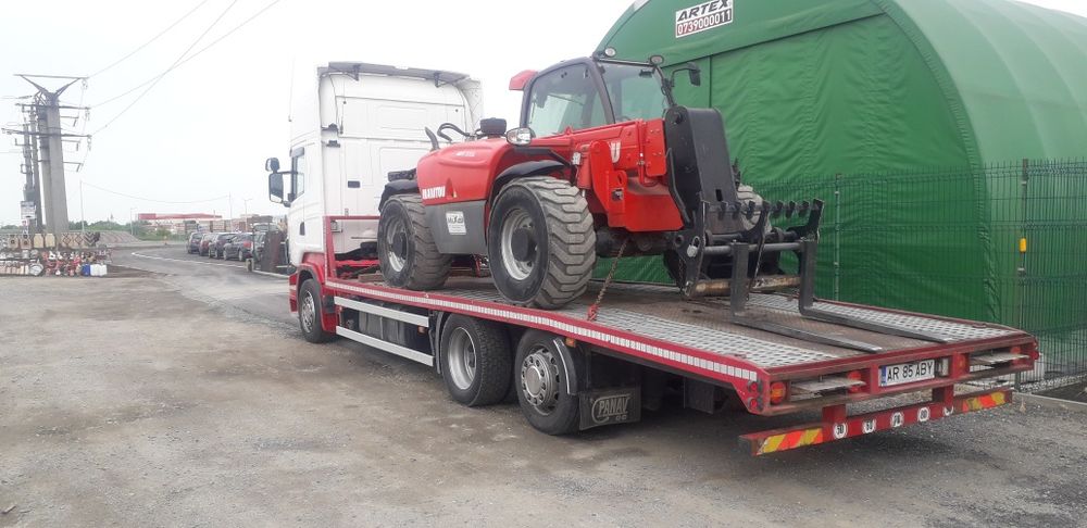 Transport utilaje . Tractări auto
