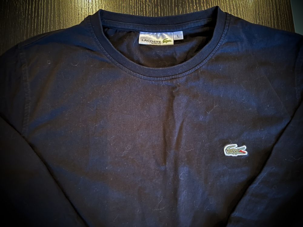Блузи на Lacoste