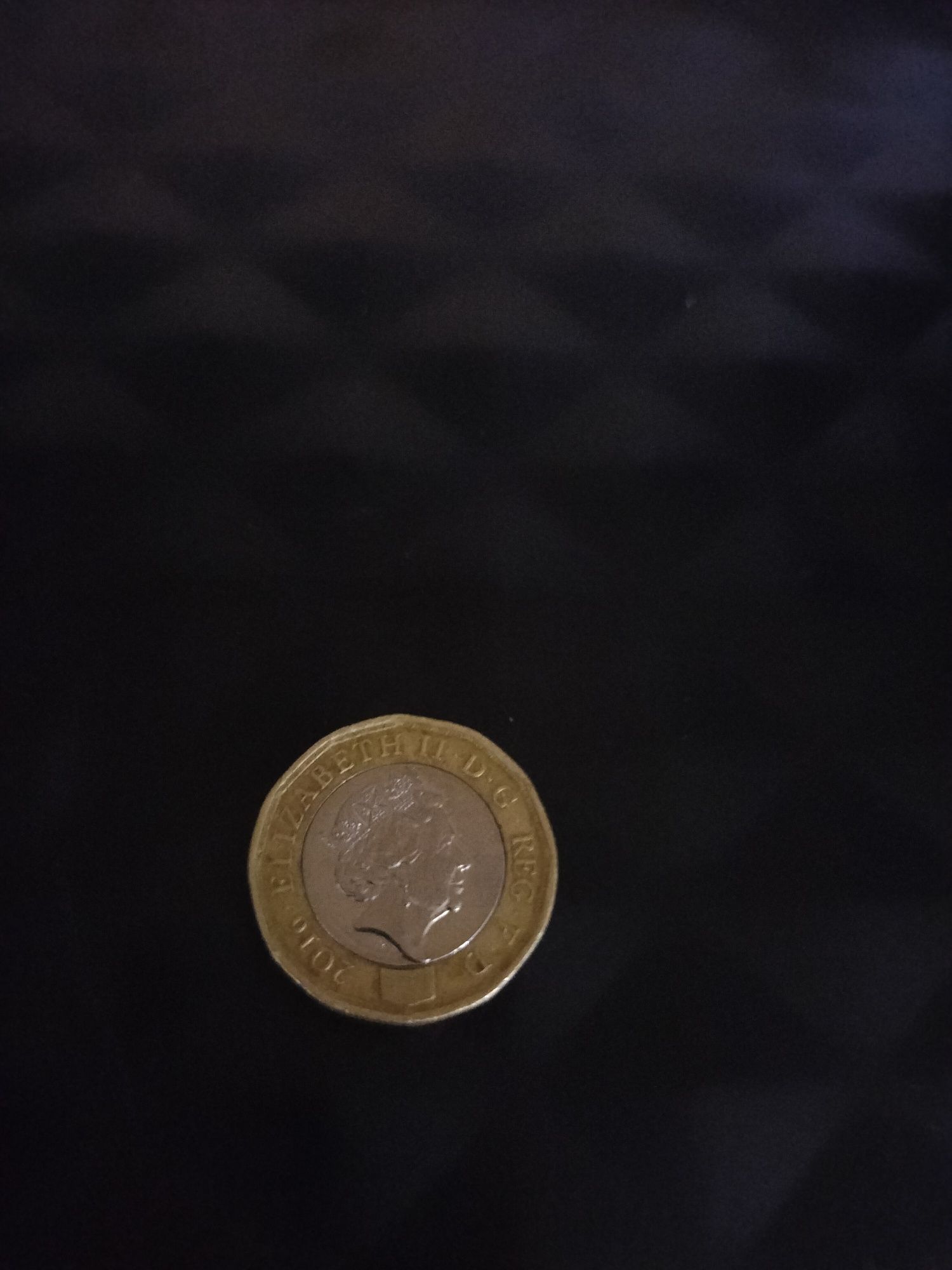 monedă one pound de colecție