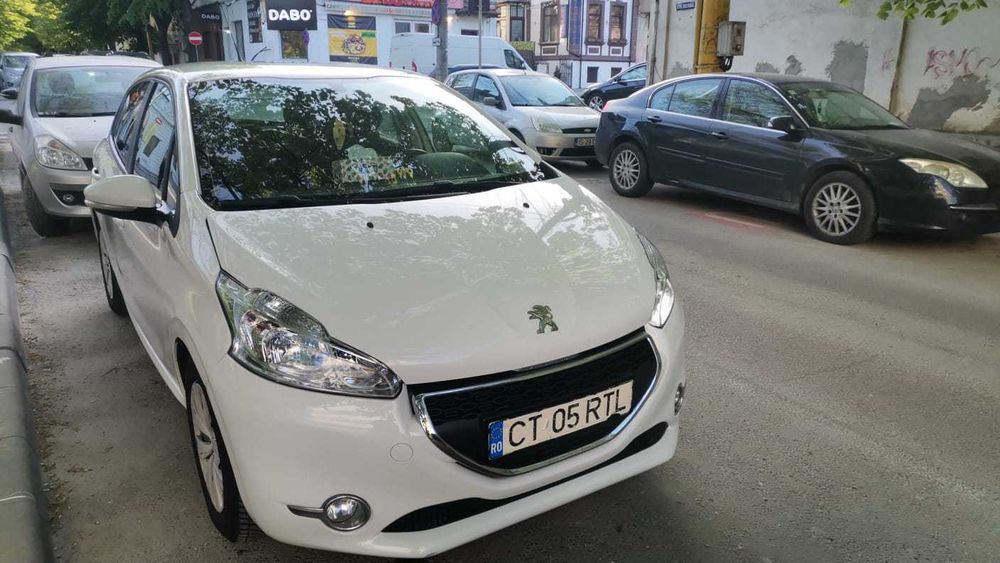 Vând Peugeot  208 An 2014