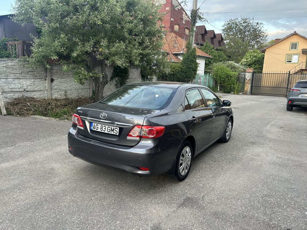 Toyota Corolla motor 1600 cc, an 2012, de la primul proprietar.