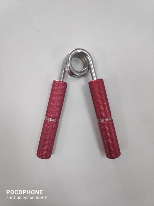 Эспандер от компании "TORNEO" с силой сдавливания 55Кг,в хорошем с/и