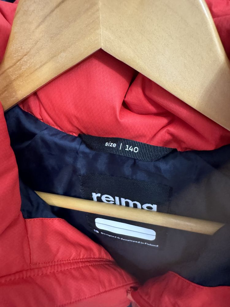 Продам зимнюю куртку пуховик Reima.,