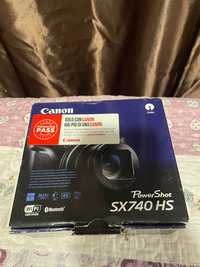 Canon SX740HS.  Sigilat
