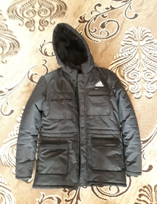 Куртка зимняя,чёрного  цвета  для мальчика  подростка.