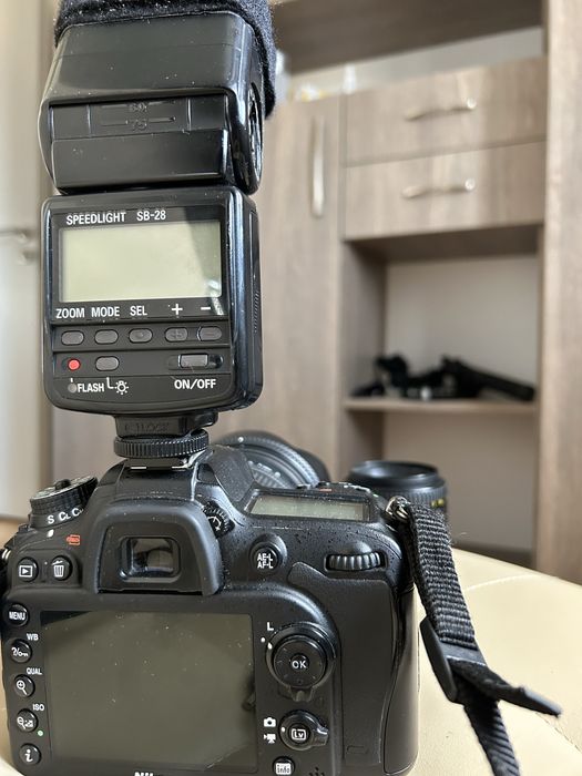 Nikon D7100 body +blit+2 obiective (sigma 17-50 f2.8 & nikkor 50 f1.8)